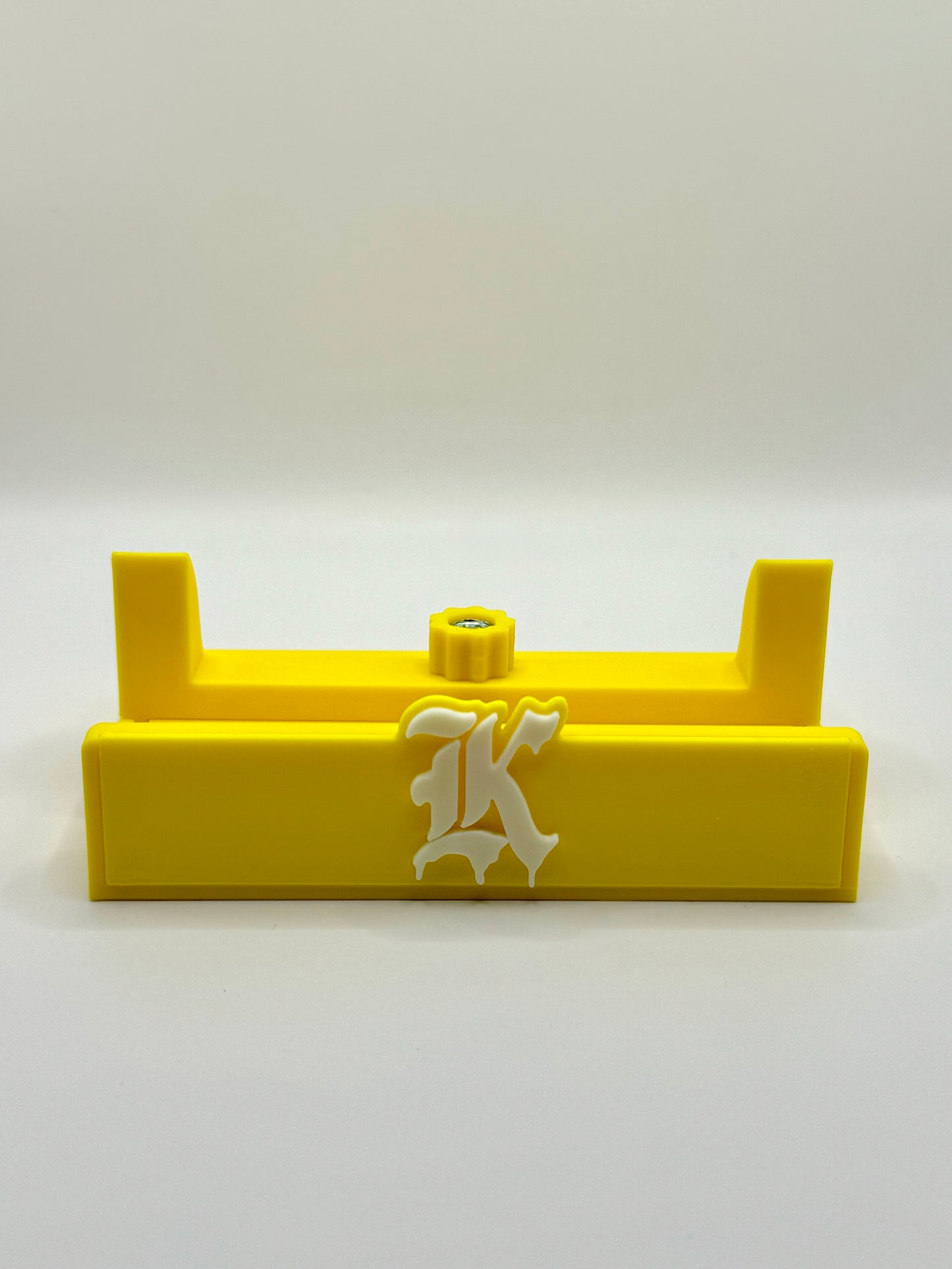 Kickstradomis Logo Stand - Yellow Base with White Logo
