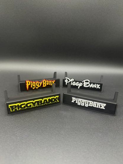 Four PiggyBanx themed stands