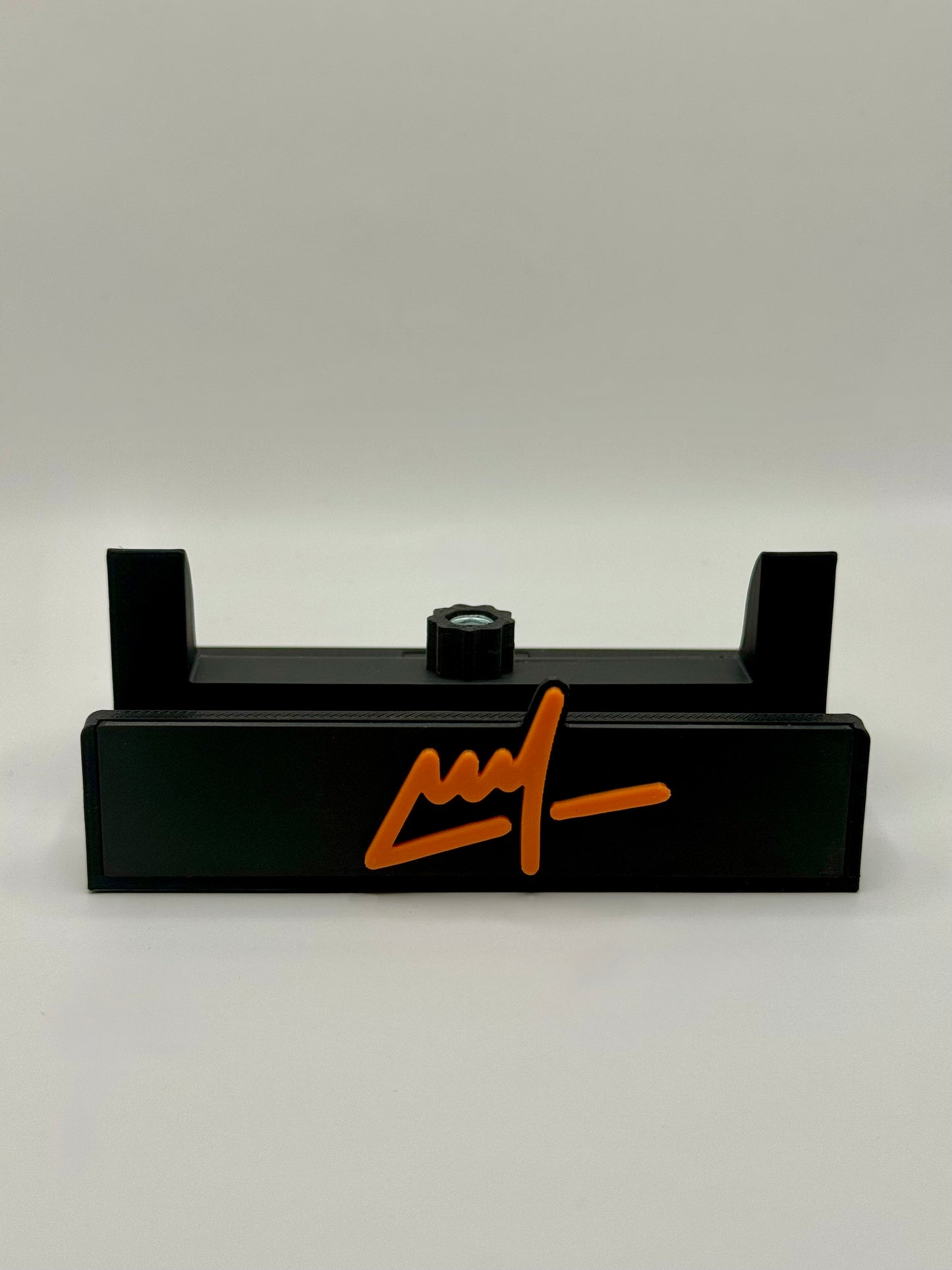 Wegs Logo Stand - Black Base with Orange Logo